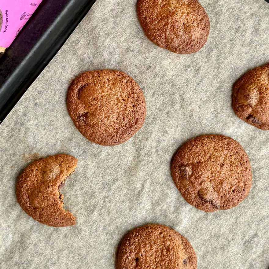 Freshly baked chocolate chip cookies on the tray